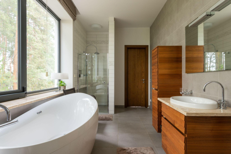 a bathroom with a large mirror